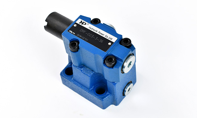 如何根據系統需求調整壓力閥的設定值?